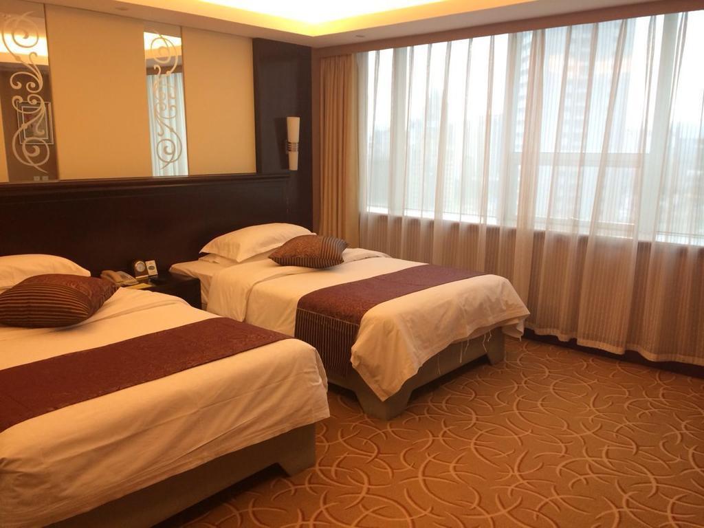 Green Land Hotel Кунмин Стая снимка
